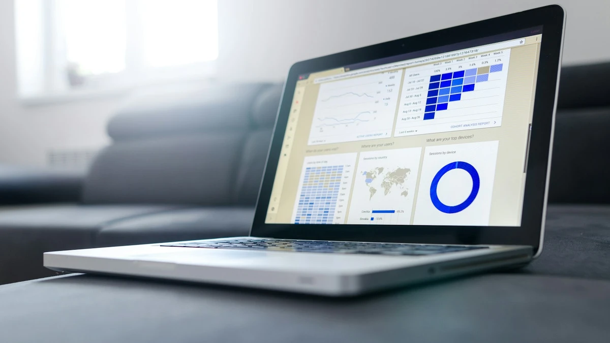 Laptop interface displaying investment scenario modeling, dollar-cost averaging, and cryptocurrency return calculations